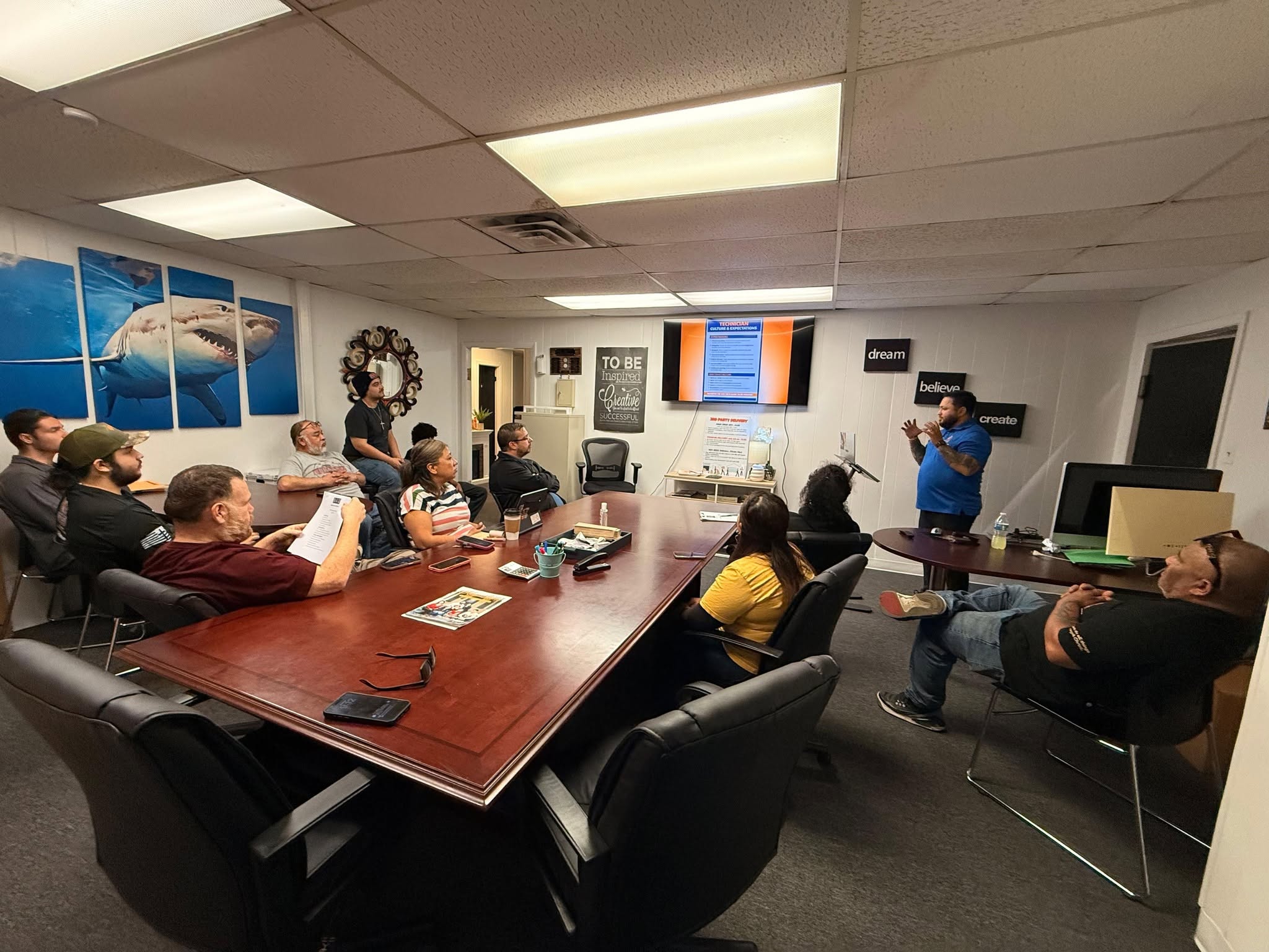 The American Appliance Repair team in a training meeting, Corpus Christi