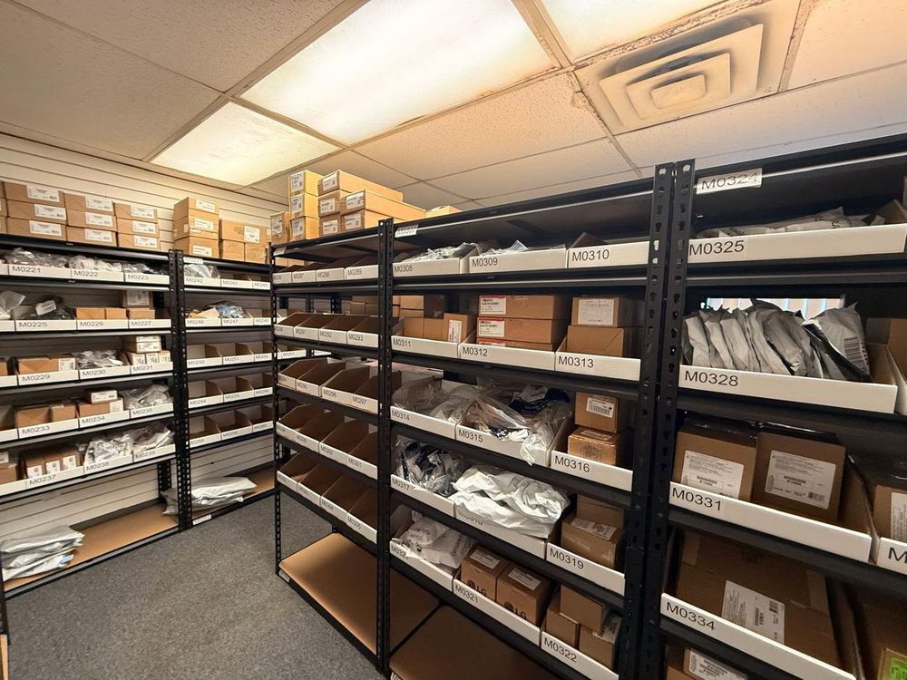 Inside the parts room: hundreds of labeled bins mean your repair isn't waiting on a shipment from Michigan.