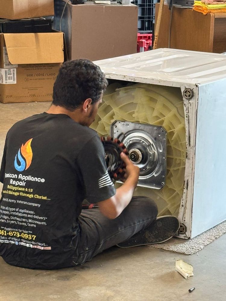 Hands-on in the shop: one of our technicians rebuilding a washer drive assembly at 3701 Apollo Rd.